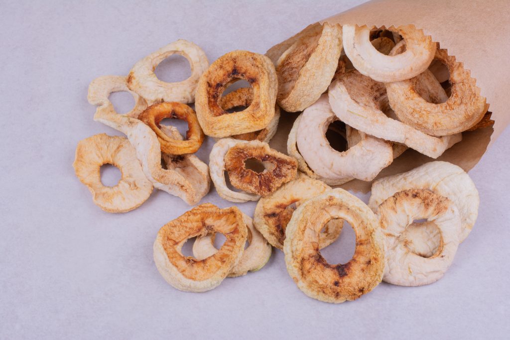 dry apple slices inside paper wrap